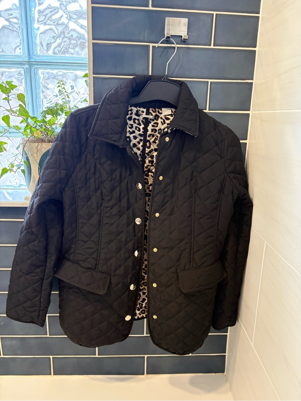 Black Quilted Jacket with Leopard Print Lining